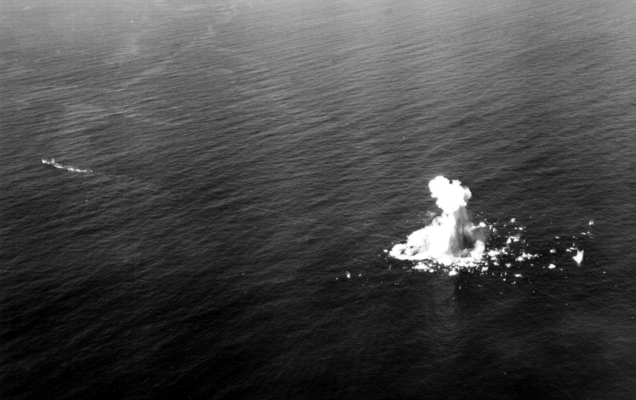 Ex-LST-482 (nearly obscured in the explosion) takes a Mk. 14, Mk.3A torpedo (note track) from Segundo’s stern tubes during an exercise on 29 February 1956. (U.S. Navy Photograph 80-G-688126, National Archives and Records Administration, Still Pic...