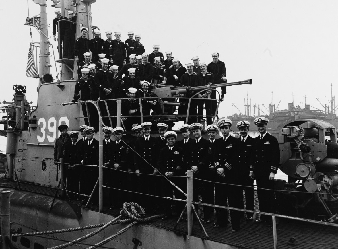 Group portrait of the crew of Segundo, photographed by O.W. Waterman, at her homeport of San Diego, about 1946. (Naval History and Heritage Command Photograph NH 64044)