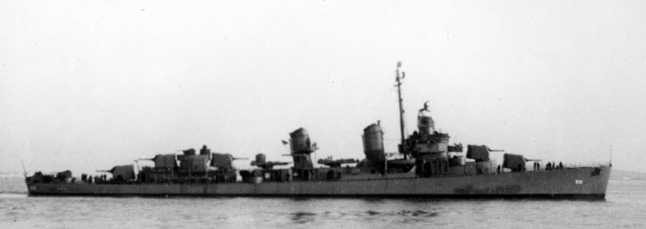 Starboard broadside view of Spence at Boston, 25 January 1943, as originally fitted-out, with a single 40-millimeter gun on her fantail, and carrying only five 20-millimeter Oerlikons. (U.S. Navy Bureau of Ships Photograph BS-40061, 19-LCM Collec...