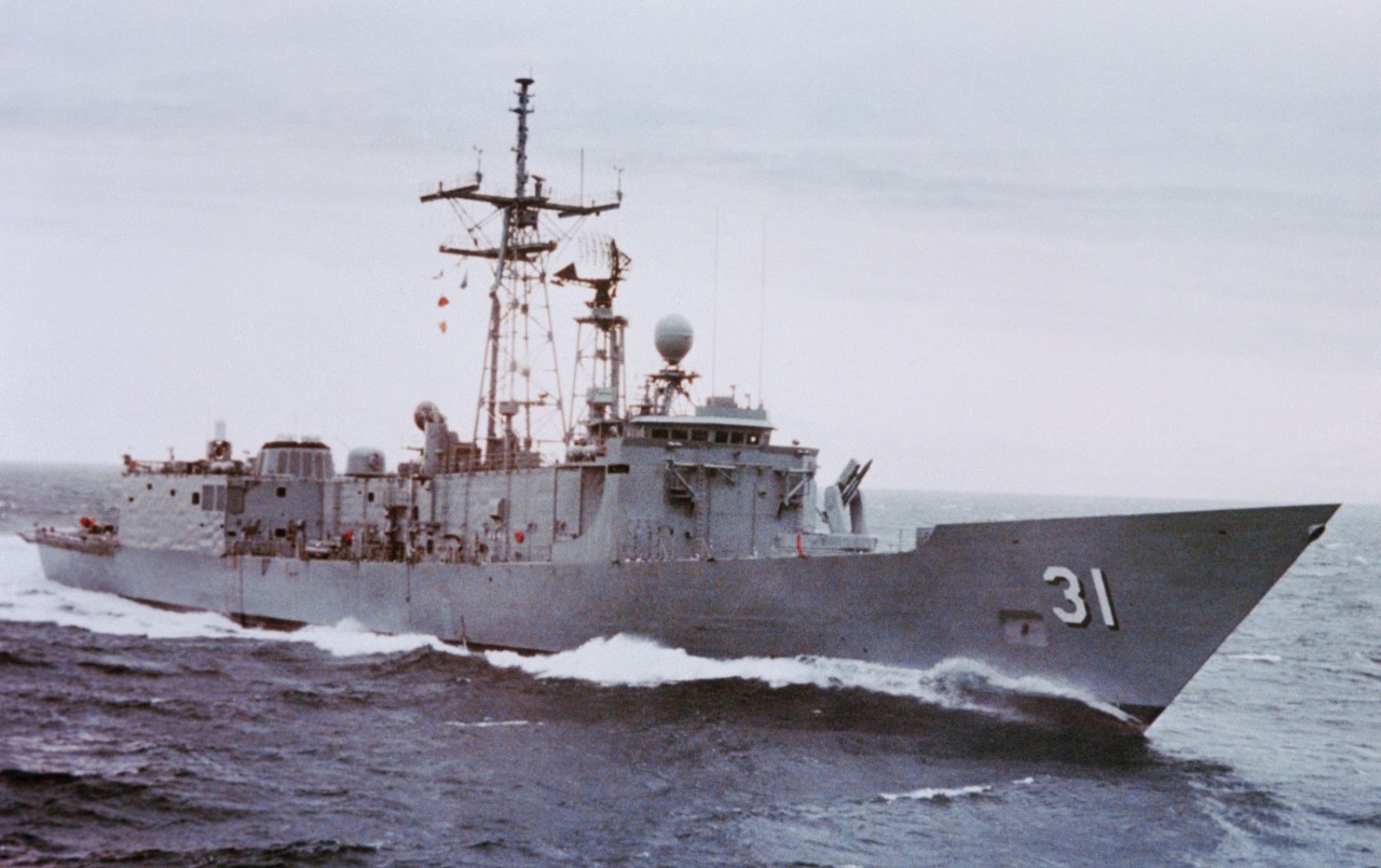 Stark gracefully glides through calm swells while completing her sea trials in the Pacific Ocean, 13 July 1982. (Todd Pacific Shipyards Corp., Department of Defense Photograph DN-SC-83-11743, Still Pictures Branch, National Archives and Records A...