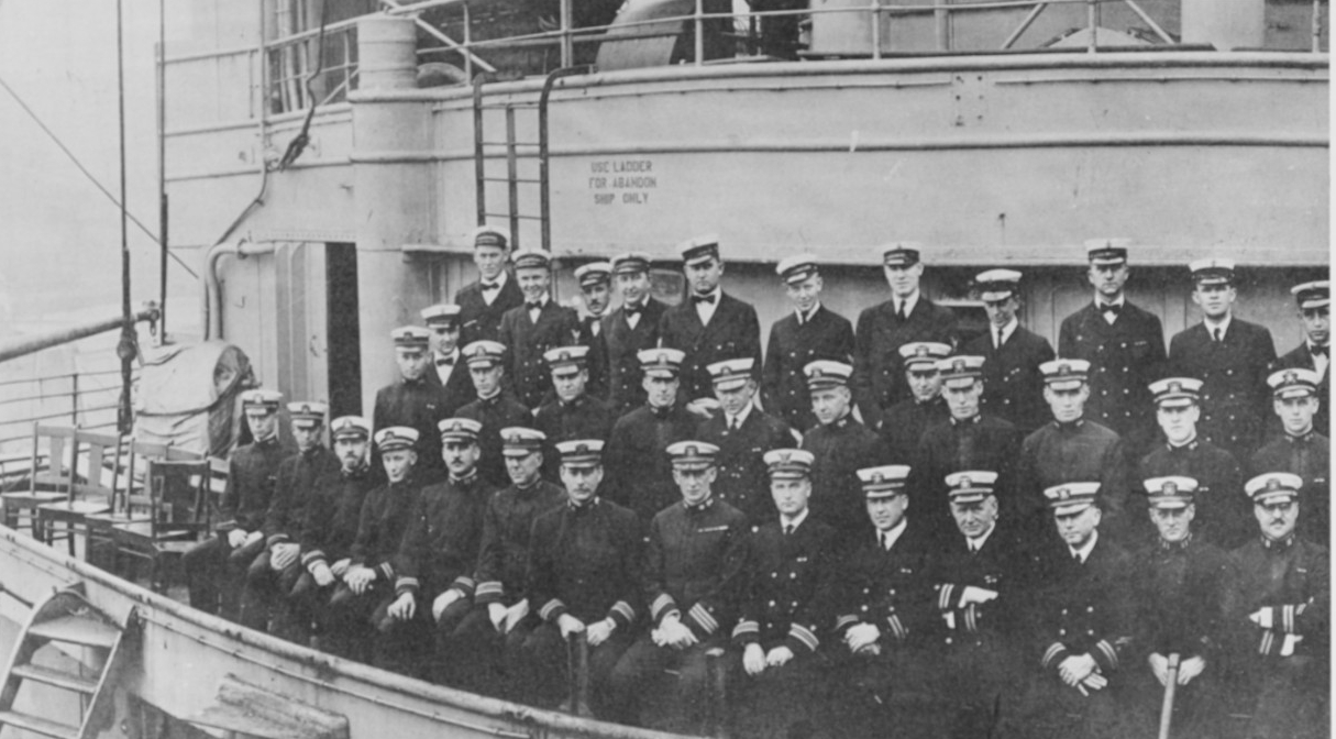 Von Steuben’s officers pose on her forward superstructure, September 1919. Cmdr. Frederick J. Horne, her commanding officer, is seated in the front row, 8th from the left. Photographed by Hughes and Estabrook, New York City. (Naval History and He...