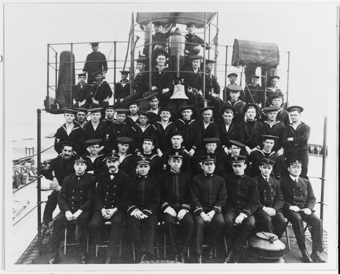 Warrington’s commissioning crew, circa March 1911. Officers are (left to right): Ens. Rufus W. Mathewson; Lt. Walter M. Hunt; Ens. Carleton M. Dolan; Ens. John B. Staley. Donor, J. Jacoby, is directly behind Lt. Hunt. Note "USS Lewis Warrington 1910" on the bell. Original print given to Naval Historical Foundation by Mr. J. Jacoby. (Naval History and Heritage Command Photograph NH 46944)
