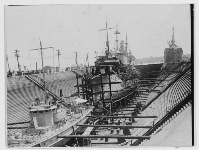 Drydocked at the Philadelphia Navy Yard, 1919. A submarine chaser is also present in the foreground. (Naval History and Heritage Command Photograph NH 46282) 