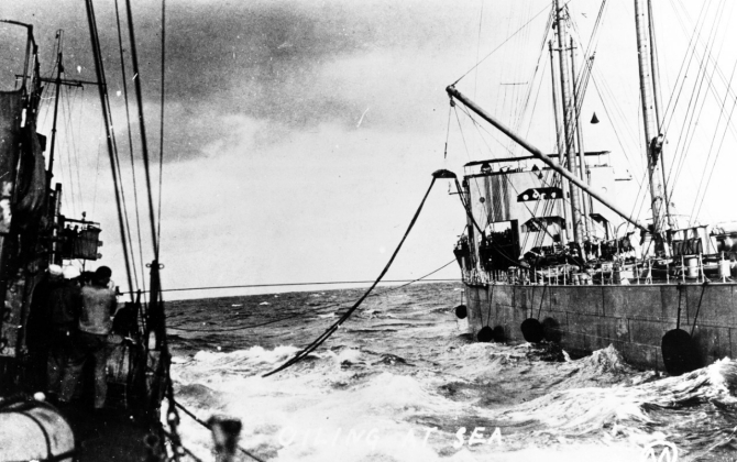 Warrington (left) oiling at sea during World War I, from either Kanawha (Fuel Ship No. 13) or Maumee (Fuel Ship No. 14). Courtesy of Mr. Gustavus C. Robbins, Somerville, Mass., 1973. (Naval History and Heritage Command Photograph NH 77154)