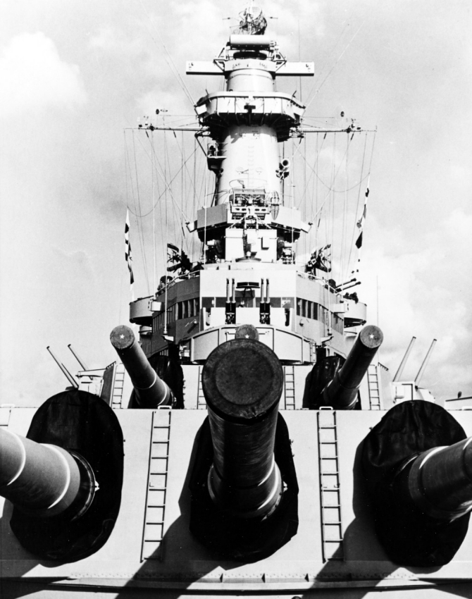 View of Wisconsin’s forward 16-inch/50 guns and superstructure, taken 21 March 1952, while she was serving with Task Force 77 in Korean waters. Note her Mk.38 main battery director and various radar antennas; photographed by AF3c M.R. Adkinson. (U.S. Navy Photograph 80-G-441034, National Archives and records Administration, Still Pictures Branch, College Park, Md.).