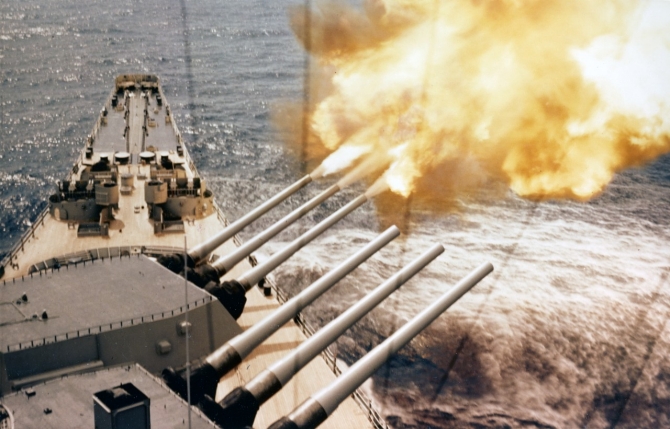 Wisconsin fires a three-gun salvo from her forward 16-inch/50 gun turret, during bombardment duty off Korea. (U.S. Navy Photograph 80-G-K-12103, National Archives and records Administration, Still Pictures Branch, College Park, Md.).