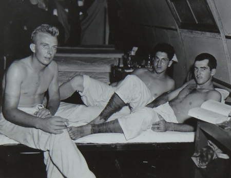 (L to R) Glen L. Milbrodt, S2c USNR; Lewis P. Bitonti, S1c USNR; and Pfc. Giles G. McCoy USMC, survivors of the USS Indianapolis in Naval Base Hospital No. 20, Peleliu, 5 August 1945.