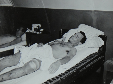 Lt. Comdr. John Reid USNR,  survivor of the USS Indianapolis in Naval Base Hospital No. 20, Peleliu, 5 August 1945.
