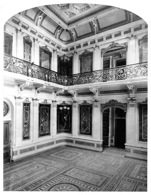 View of the interior of the library of the Navy Department, east wing as photographed ca. 1879, shortly after the room’s completion. Not the wall panels of various types of marble and the tile floor. Collection: Library of Congress, Prints & Phot...