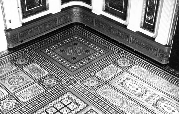 Detail of the title floor of the former library of the Navy Department, east wing. Photograph taken by Richard Cheek, summer 1976, for the Dunlap Society.
