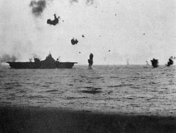 Antiaircraft action off carrier.