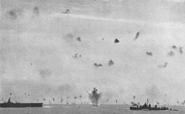 Antiaircraft action over the fleet.