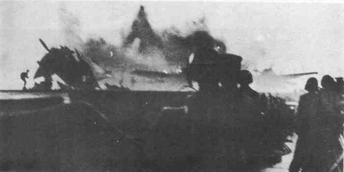 Jap suicide plane crashing in water just aft of USS Natoma Bay (CVE-62)
