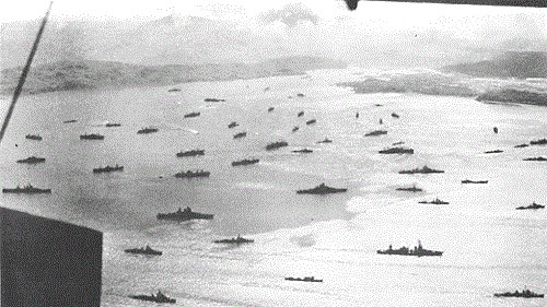 Invasion fleet gathers in Adak Harbor for assault on Kiska.