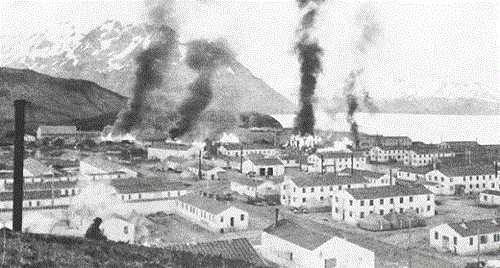 Burning buildings at Ft. Mears after first enemy attack on Dutch Harbor, 3 June