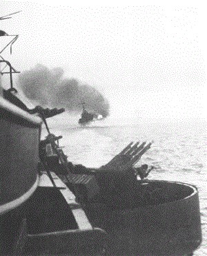 The St. Louis fires a salvo at Kiska during the bombardment of 7 August 1942