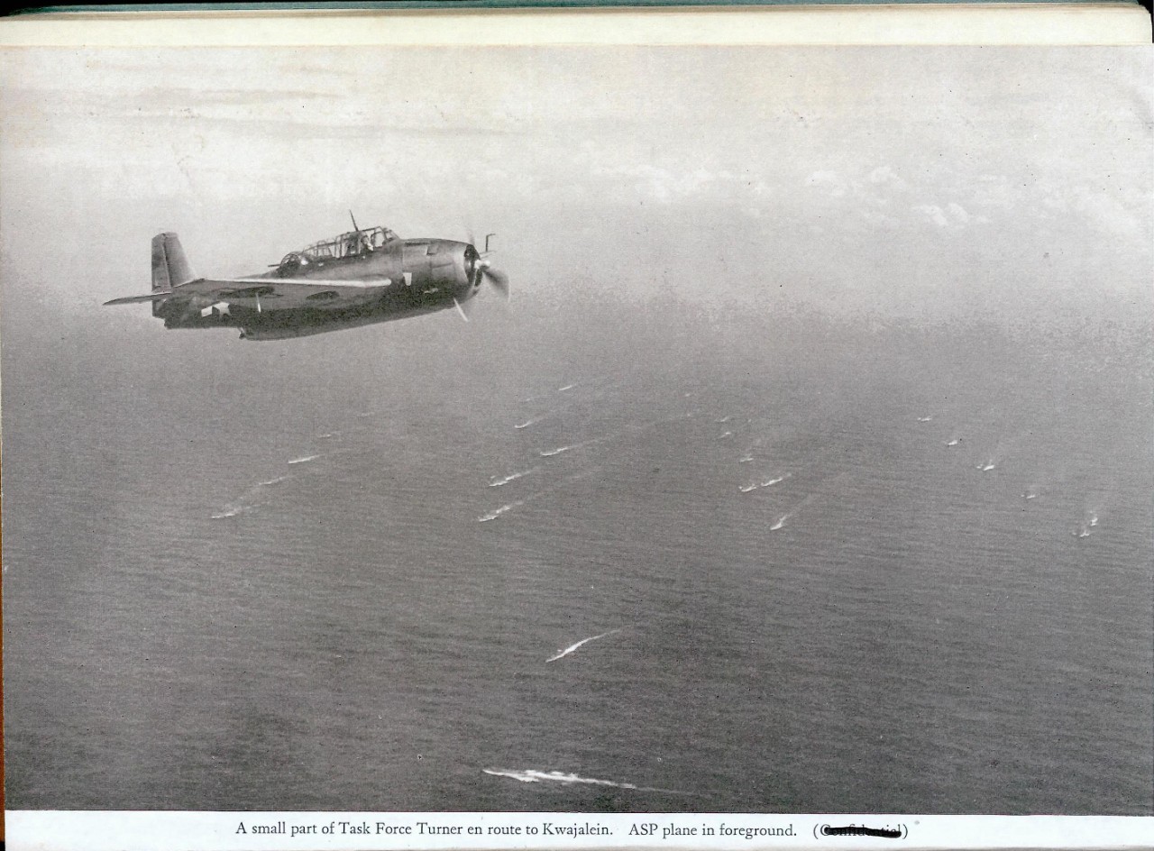 A small part of Task Force Turner en route to Kwajalein. ASP plane in foreground