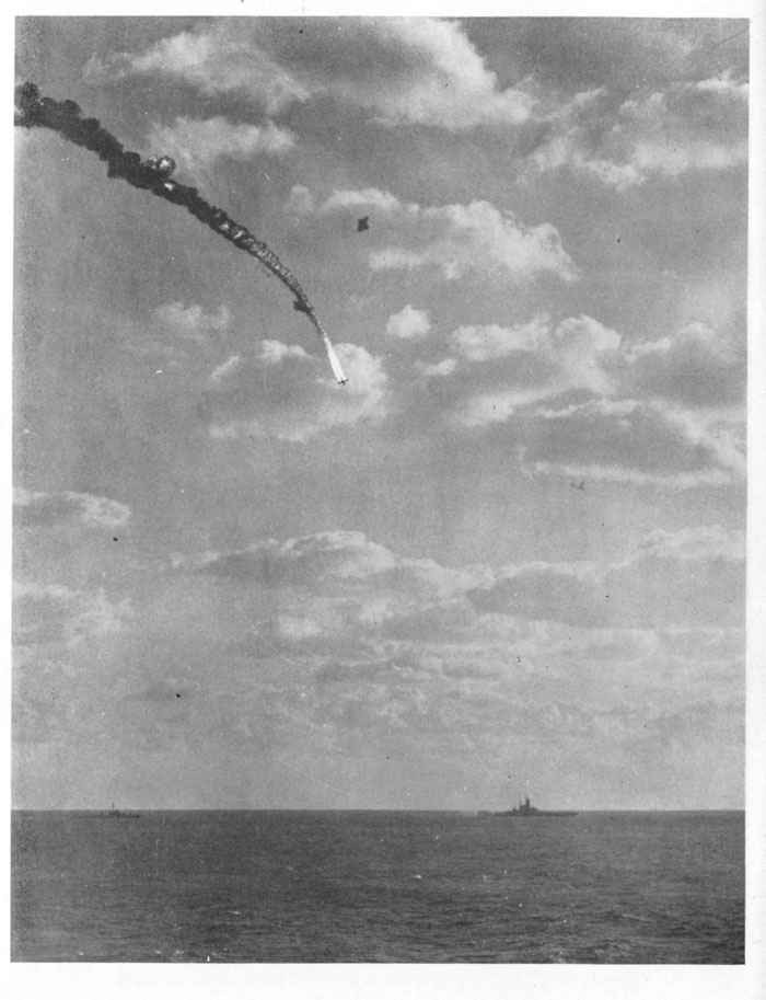 Japanese plane bursts into flames and misses target by wide margin.