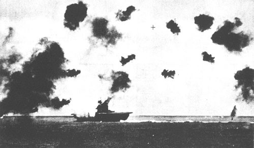 Direct hit on the Yorktown by Japanese dive bombers.