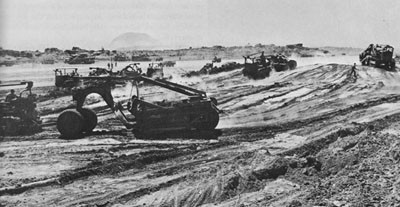 Men and Equipment of the 62nd Battalion Working on the Second Airstrip, Iwo Jima.