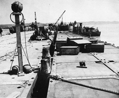 Pontoon Pier at Katchin-Hanto, Okinawa, May 1945. 