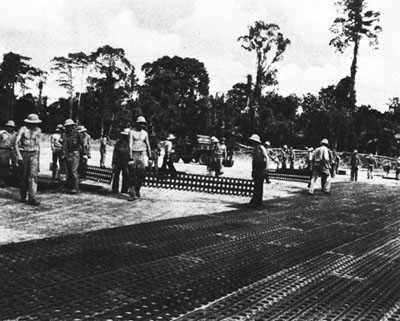Seabees Laying Pierced Plank at Bougainville. 