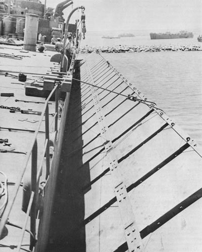 Pontoon Causeway About to Go Over the Side of an LST, Arzeu. 