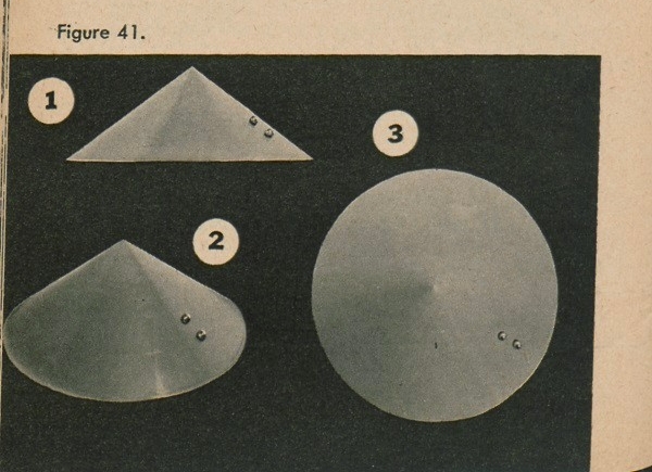 Figure 41: Three paper cones representing mountains/hills with two round objects representing boulders.