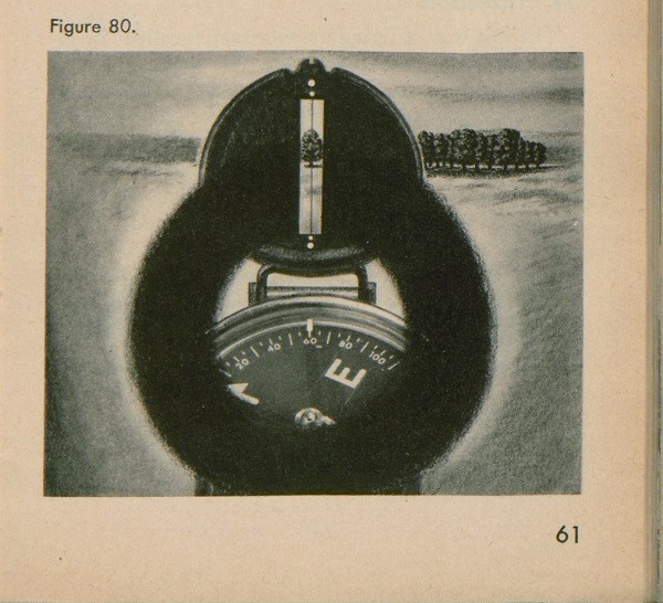 Figure 80: An up close view of looking through the front sight of a compass.