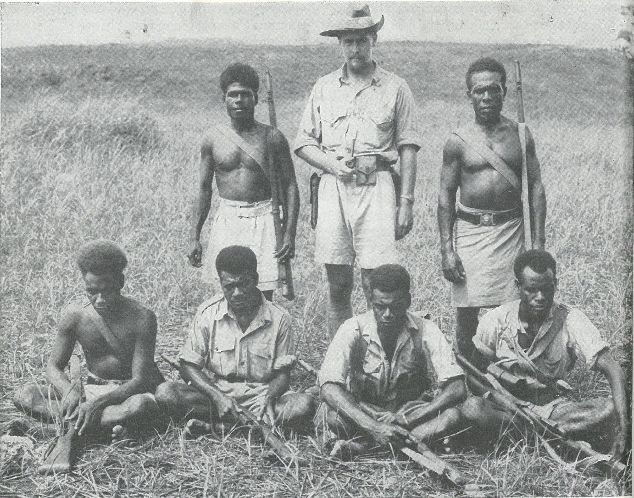 LOYAL NATIVES such as these, together with their leader, Captain Martin Clemens, Australian government representative on Guadalcanal (even while in Japanese hands) rendered invaluable services to the Marines. These natives were all members of the...