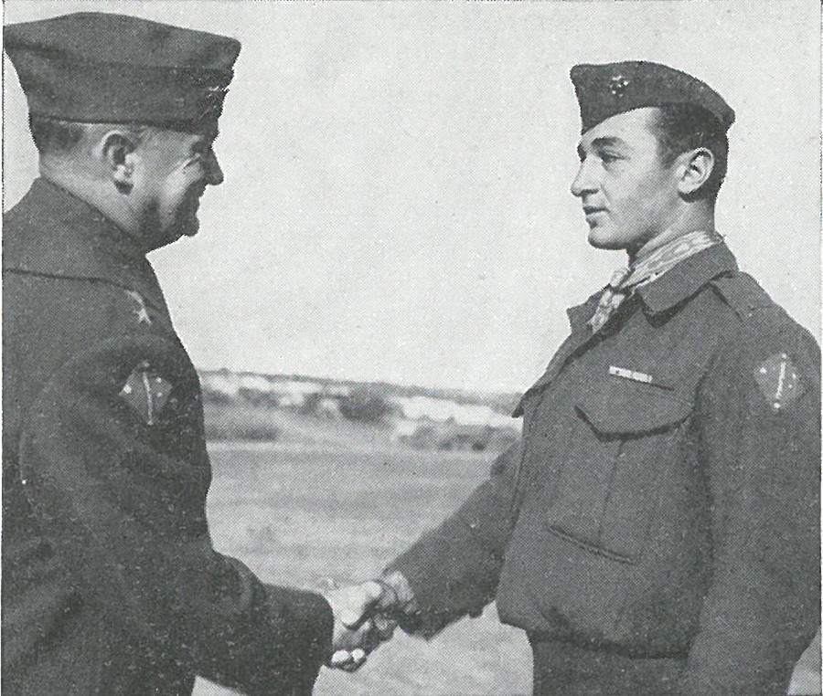 SGT MITCHELL PAIGE receives the Medal of Honor from Gen Vandegrift as a reward for outstanding heroism while manning a machine-gun of the 2d Battalion, 7th Marines.