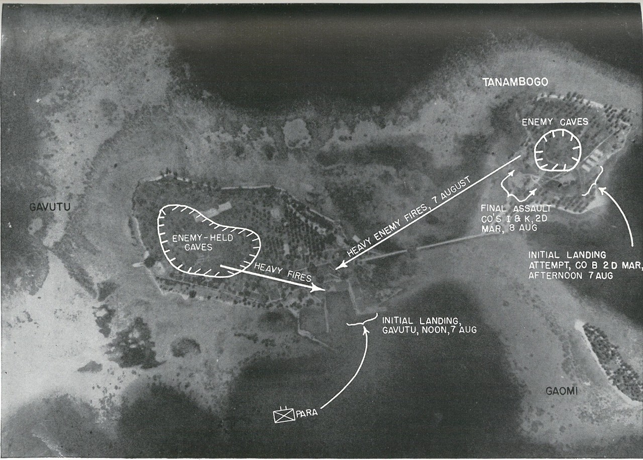 SURPRISE WAS IMPOSSIBLE in the bitterly contested Gavutu-Tanambogo landings as depicted in this overprint. The photograph itself was taken by Japanese aircraft early in 1942 prior to enemy seizure of the Tulagi-Guadalcanal area.