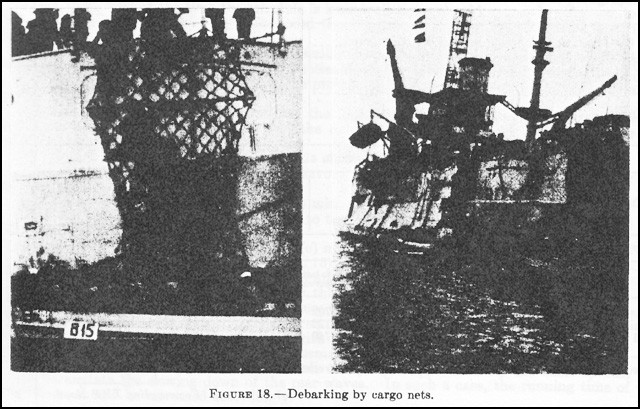 Figure 18. - Debarking by cargo nets.