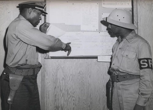"'Negro Officers in Naval Reserve now on duty outside US.' - First Negro officers of the US Naval Reserve are now on duty outside the continental United States, a group having recently arrived in Pearl harbor to serve in the Fourteenth Naval District."