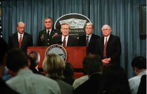 Secretary Rumsfeld at his Pentagon press conference the evening of 11 September, with (left to right) Secretary of the Army Thomas White, Chairman of the Joint Chiefs of Staff General Hugh Shelton, Sen. John Warner (R-Va.), and Sen. Carl Levin (D-Mich.).