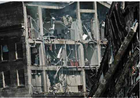 Damaged interior offices sheared open by the collapse of the E Ring.