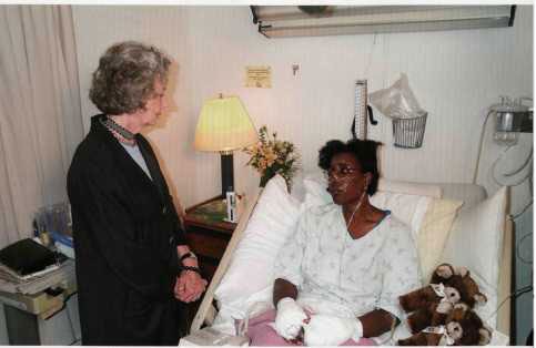 Joyce Rumsfeld, the wife of the defense secretary, visits Sheila Moody, 13 September 2001.