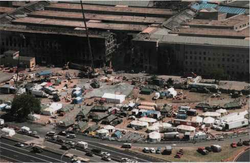 Days after the attack, the lawn west of the Pentagon filled with vehicles, equipment, and tents for command and control, search and recovery, shoring, demolition, and security.
