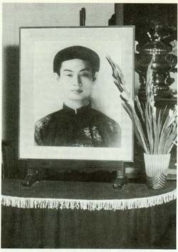 Hoa Hao altar bears portrait of religion's founder, Huyen Phu So.