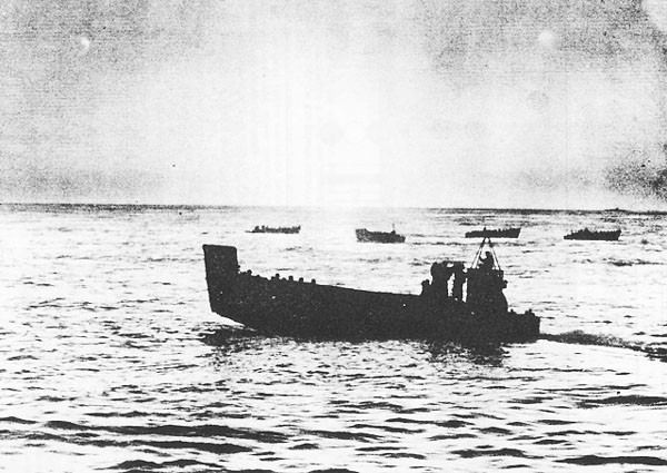 A group of five landing craft.