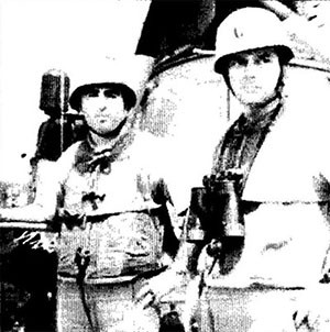 Captain John J. Herrick (left), the on-site task force commander, and Commander Herbert Ogler, commanding officer of the Maddox