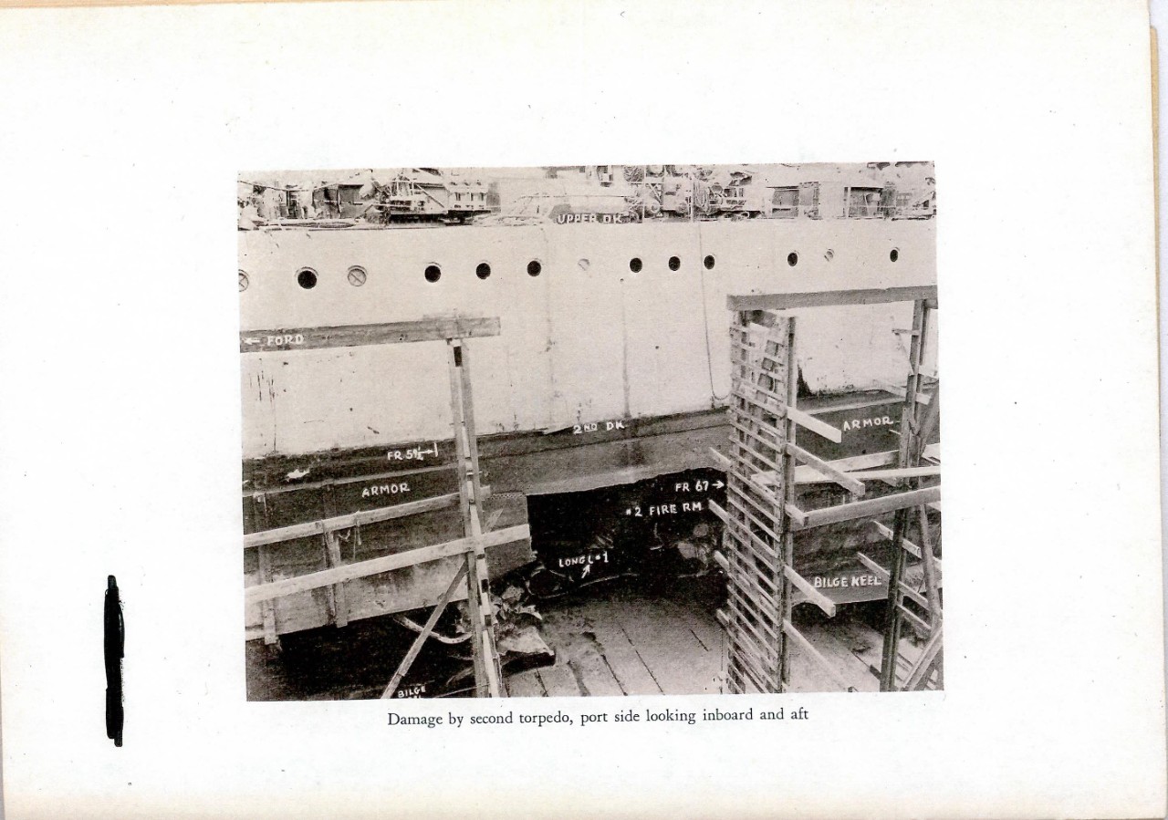Damage by second torpedo, port side looking inboard and aft