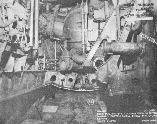 Photo 42: WADLEIGH (DD 689) Looking forward after removal of damaged bottom plating. Note centerline keel cut beyond plating.