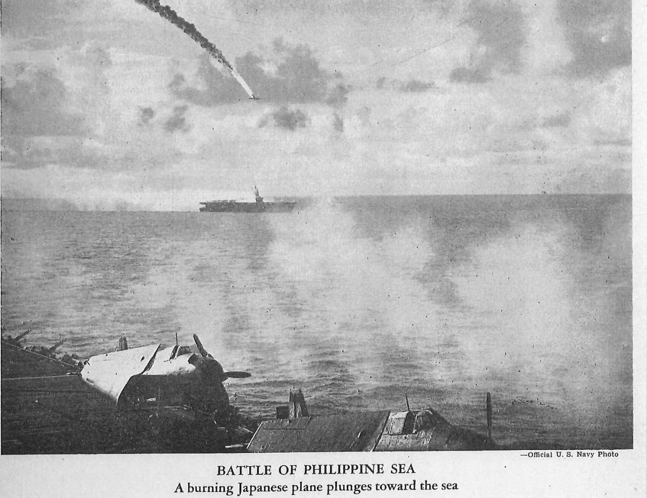 Battle of Philippine Sea, a burning Japanese plane plunges toward the sea