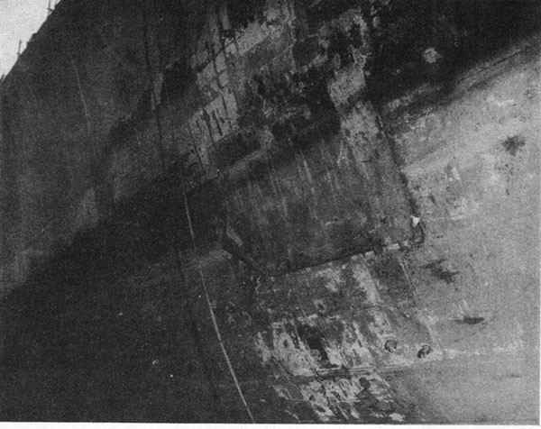 KILLEN (DD593). View of bow in ABSD2 at Manus, from port side looking slightly forward, showing patches and plugs installed by salvage personnel at Leyte.