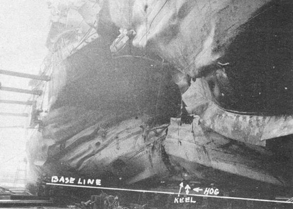 Photo 3: 19 January 1943 - General view of torpedo damage looking forward.