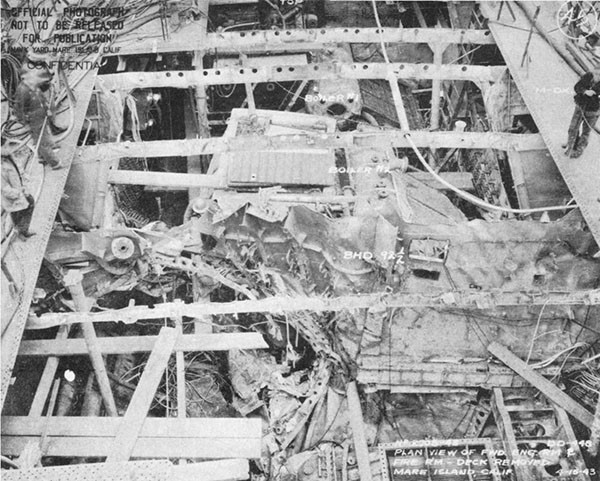 Photo 21: Plan view of forward engineroom and fireroom, showing damage to port shell and bulkhead 92-1/2.