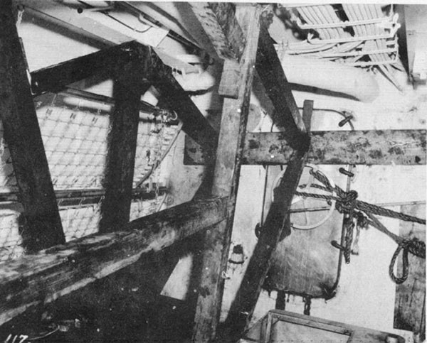 Photo 34: Compartment C-201-L showing shoring to bulkhead 157 performed by ABNER READ's repair parties.