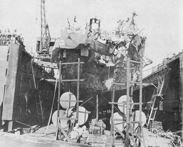 Photo 40: General view of damage to stern of USS KENDRICK while in dry dock Oran.