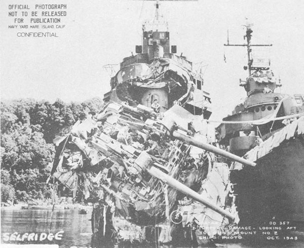 Photo 49: Bow view of torpedo damage to USS SELFRIDGE while alongside O'BANNON in Tulagi Harbor.
